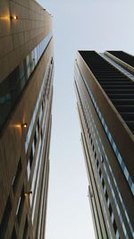 Low angle view of modern building against clear sky