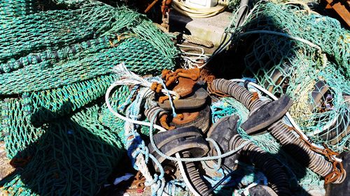 High angle view of fishing nets in boat