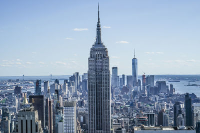 Modern buildings in city against sky