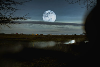 Scenic view of sea against sky at night