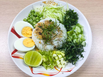 High angle view of salad in plate on table