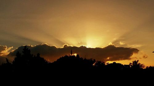 Scenic view of landscape against sky during sunset