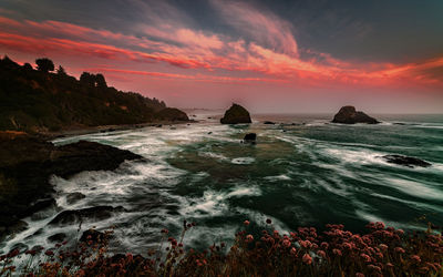 Scenic view of sea against sky during sunset