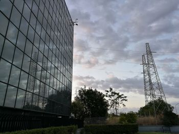 View of tower against cloudy sky