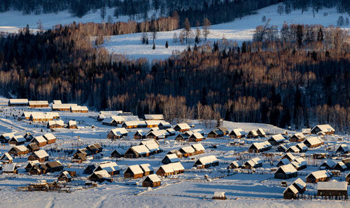 Panoramic view of snow covered land