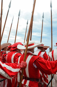 Red flags against sky