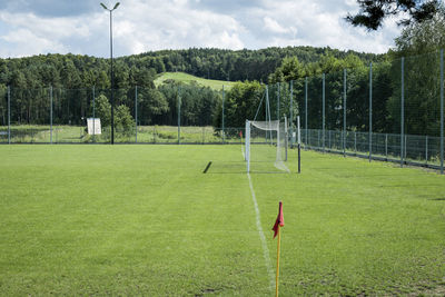 Small football field beautifully situated between hills and forest. jacnia, poland