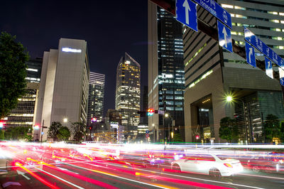 High angle view of light trails on road at night