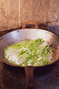 High angle view of rice in container