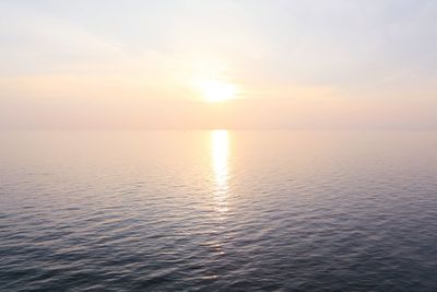 Scenic view of sea at sunset