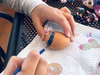 High angle view of woman holding hands