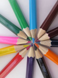 High angle view of multi colored pencils on table