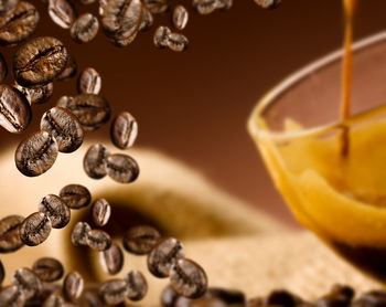 Close-up of coffee beans on table