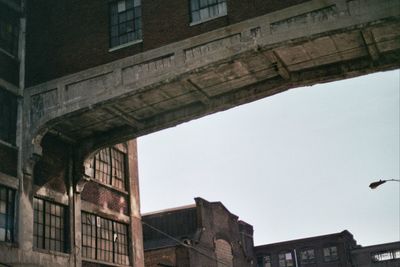 Low angle view of buildings against clear sky