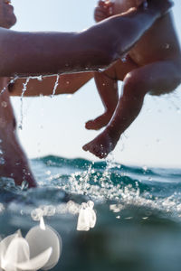 People splashing in swimming pool