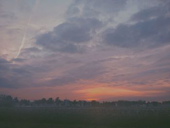 Scenic view of landscape at sunset