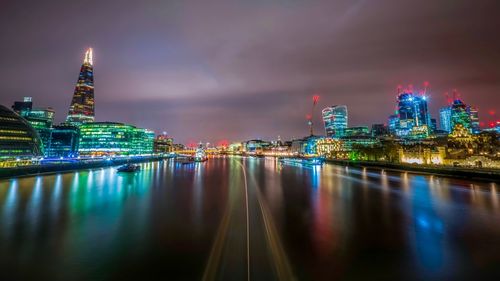 Illuminated buildings in city at night