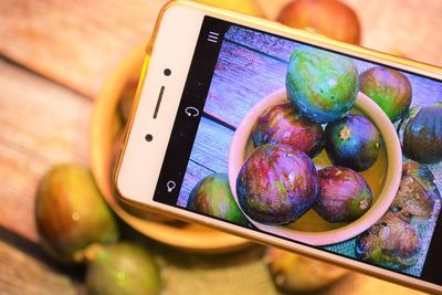 High angle view of mobile phone on table