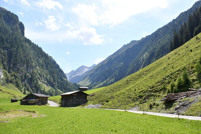 Scenic view of landscape and mountains against sky