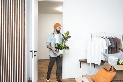 Portrait of smiling couple standing at home