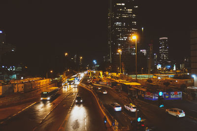 Traffic on city street at night