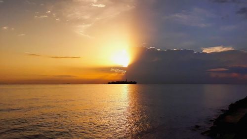 Scenic view of sea against sky during sunset