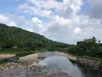 Scenic view of river against sky