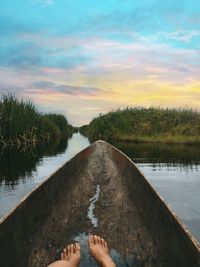 Scenic view of river against sky during sunset