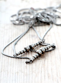 Close-up of necklace on table