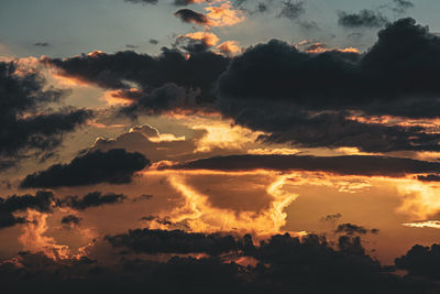 Low angle view of dramatic sky during sunset