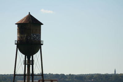 Low angle view of water tower against sky