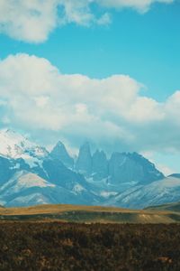 Scenic view of landscape and mountains against sky