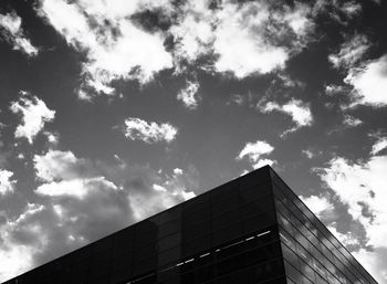 Low angle view of buildings against blue sky