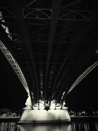 Low angle view of bridge at night