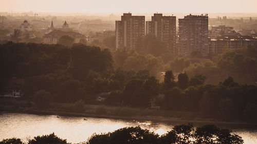 River amidst buildings in city