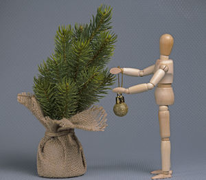 Christmas decorations hanging on tree