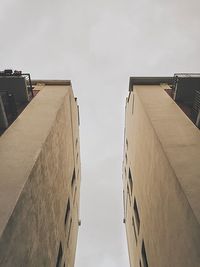 Low angle view of buildings against clear sky