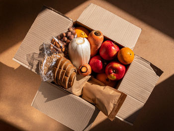 Healthy food delivery harsh shadow. take away products package donation box online shopping delivery