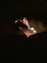 Close-up of bonfire against black background