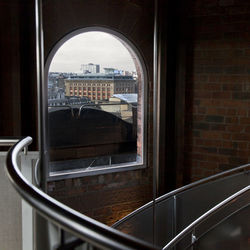 View of cityscape through window