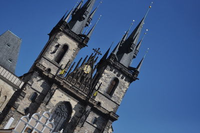 Low angle view of cathedral against blue sky