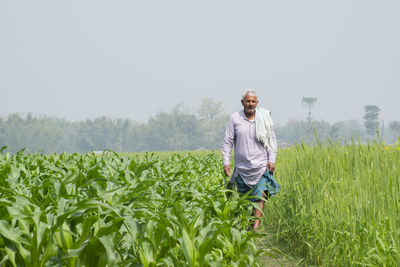 Portrait of indian farmer at agricultural field