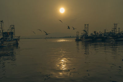 Scenic view of sea against sky during sunset