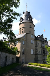 Low angle view of historic building against sky