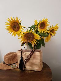 Close-up of sunflowers in vase on table