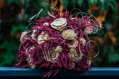Close-up of pink flower on table