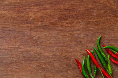 Close-up of red chili pepper on table