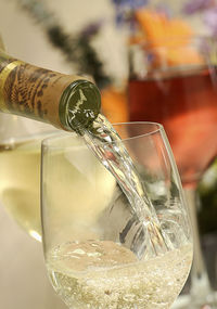 Close-up of beer glass bottle on table