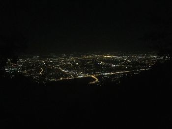 Aerial view of illuminated cityscape