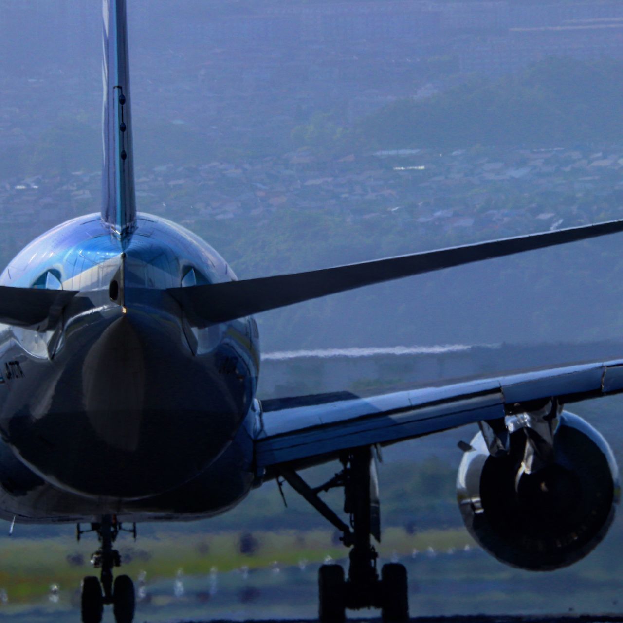 air vehicle, airplane, mode of transportation, transportation, travel, flying, airport, sky, nature, airport runway, no people, outdoors, day, glass - material, on the move, motion, cockpit, propeller, aerospace industry, public transportation, plane, arrival